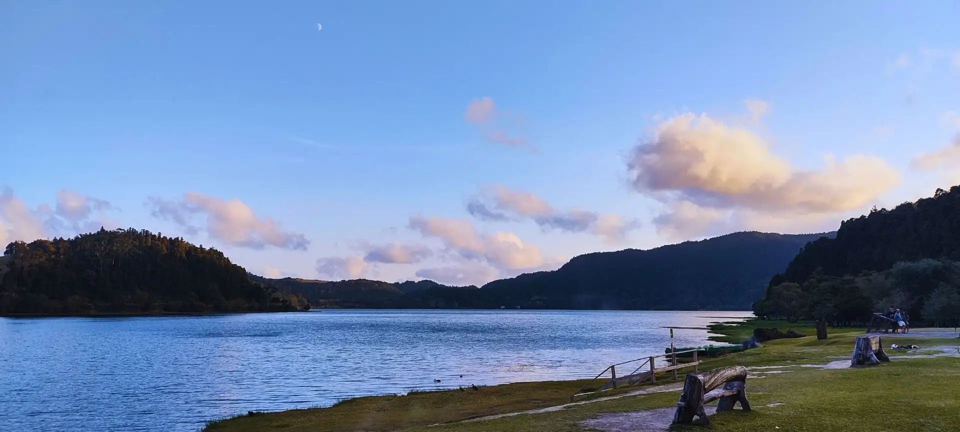 The inside of a caldera lagoon, with benches that can be seen nearby.