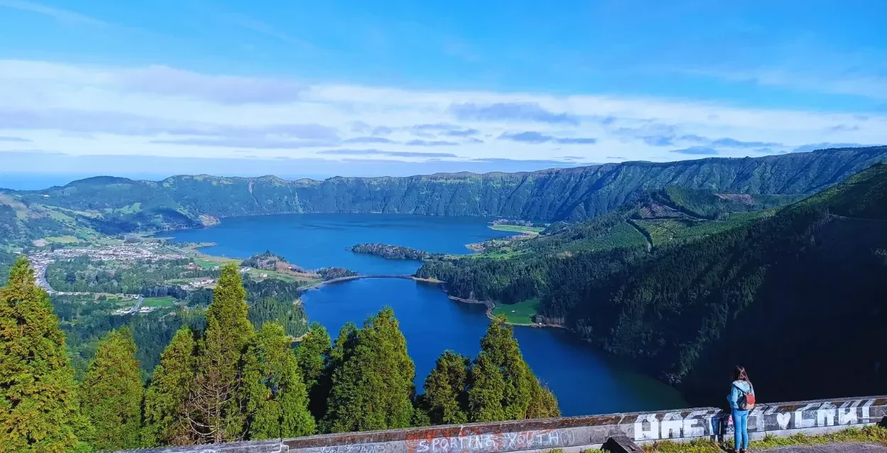 A view of a caldera from the top of a hotel.