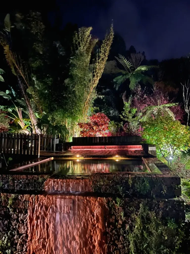 A hot springs pool at Furnas by night.