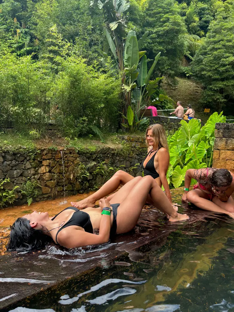 Guests enjoying Furnas hot springs on a night tour from Ponta Delgada, São Miguel, Azores
